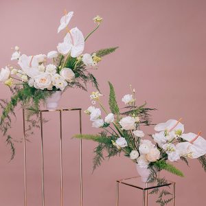 Asetelmat jalustalla